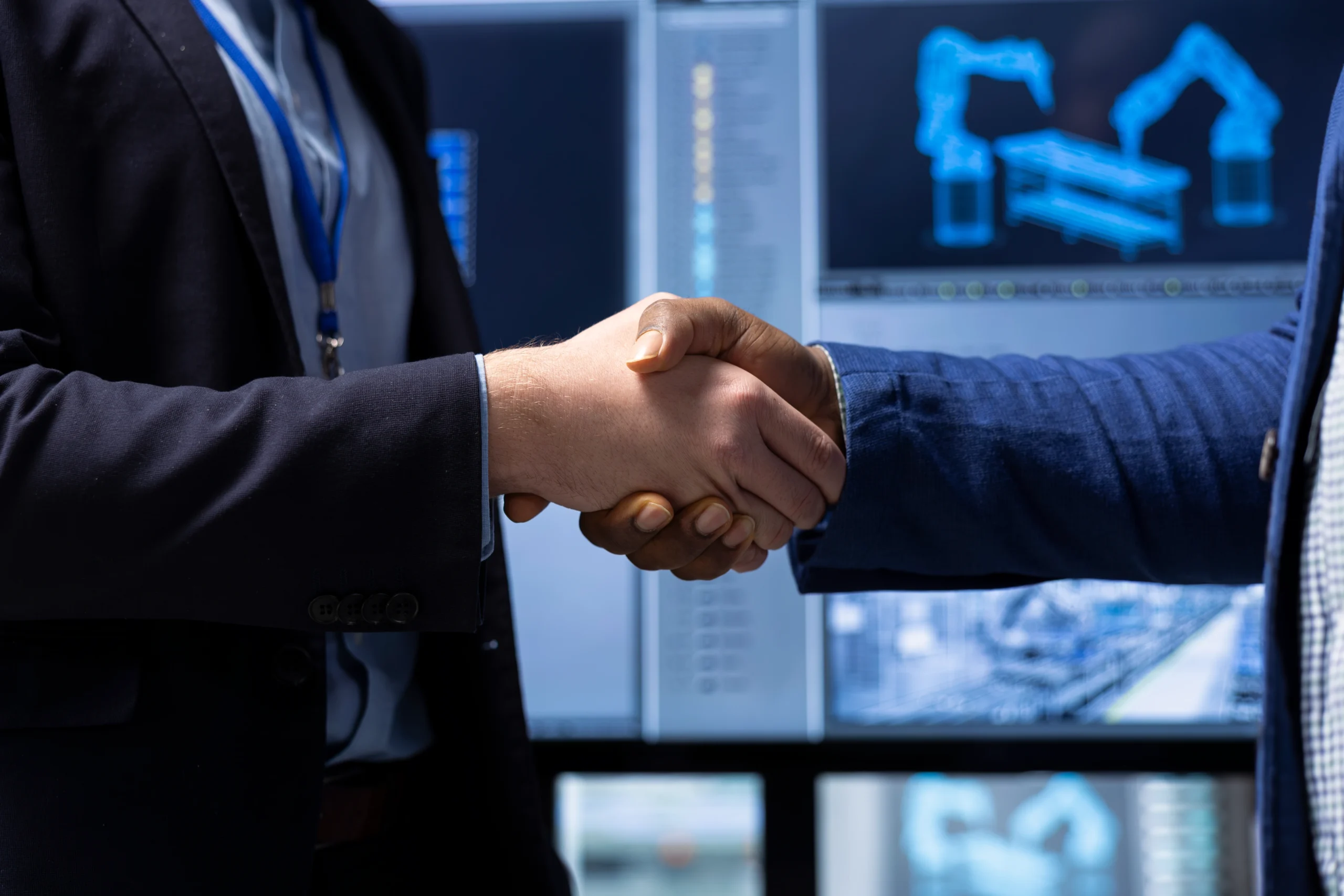 Handshake between two business professionals symbolizing a successful partnership in extrusion machine manufacturing, representing collaboration for extrusion line setup, installation, and support services by extrusion machine manufacturers in India and extruder suppliers.