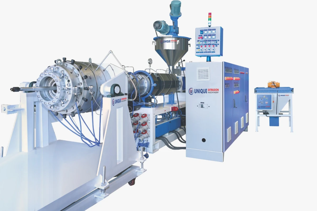 Extruder, die head and control cabinet from a PVC pipe manufacturing plant machine list, built by Unique Extrusion Machinery in Ahmedabad